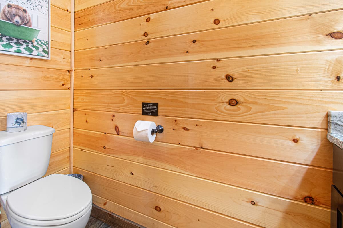With a clean, comfortable design and modern fixtures, it’s perfectly located for easy access from the main living areas.