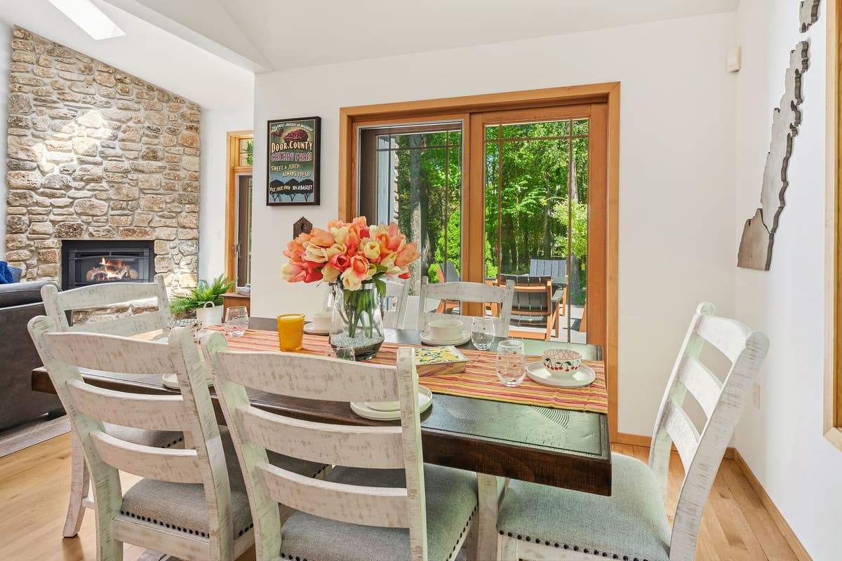 Spacious dining area with comfortable seating for up to 6 guests, perfect for enjoying meals and gathering together.
