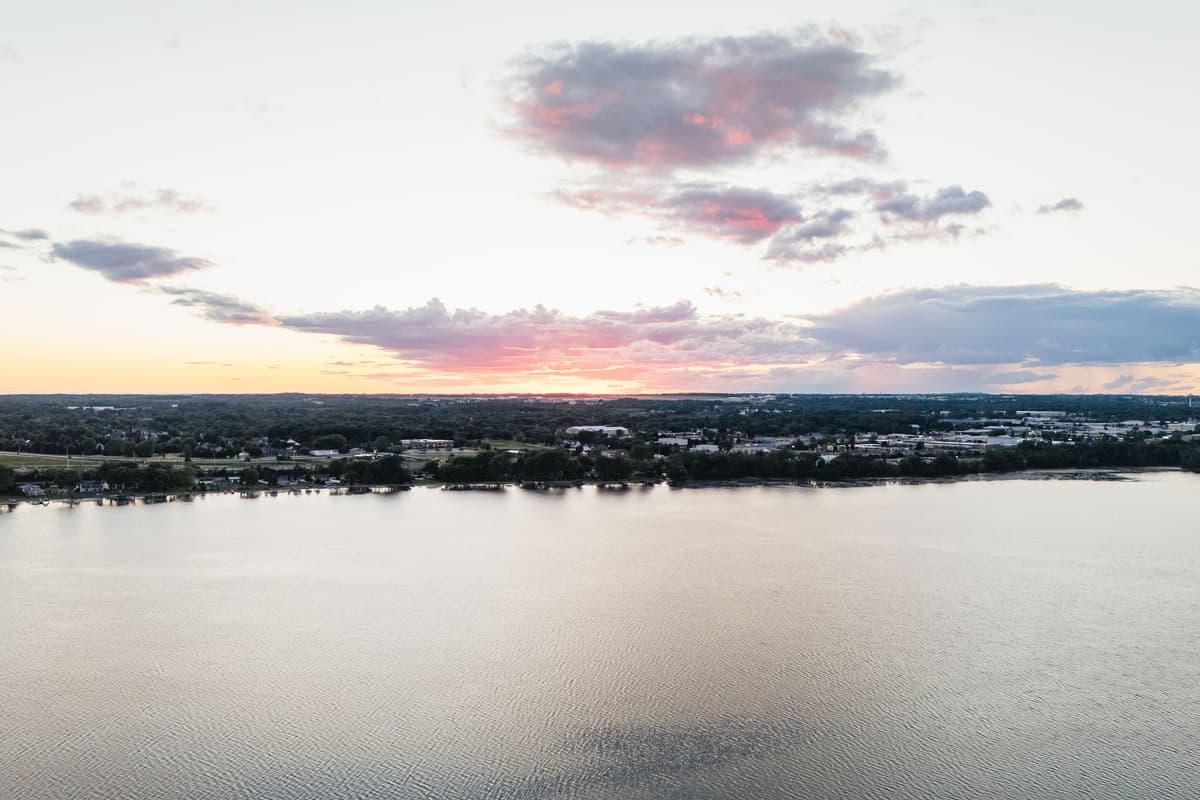 Enjoy beautiful sunset views over Lake Butte des Morts, where peaceful waters and colorful evening skies create the perfect backdrop for a relaxing lake getaway.