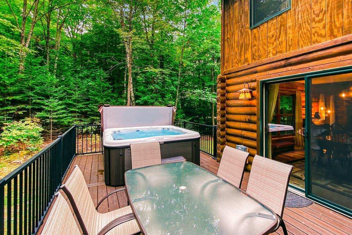 Step outside onto the spacious deck, where you’ll find a private hot tub and comfortable outdoor seating.