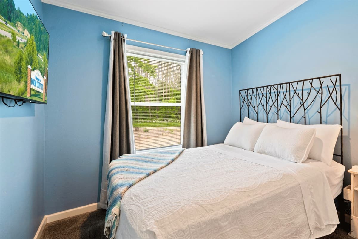 Experience tranquility and style in this beautifully appointed bedroom – your haven for rest, relaxation, and sweet dreams.