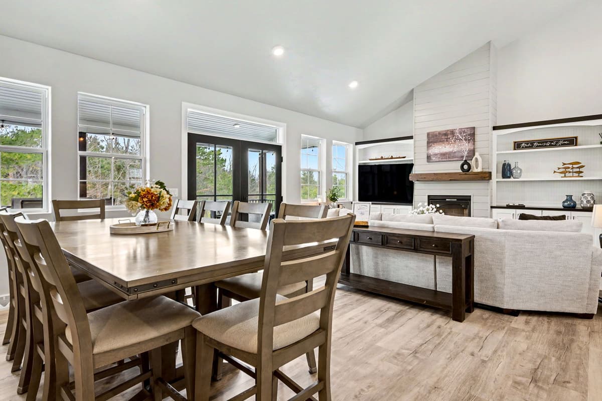 Gather around the dining table and enjoy meals together in a comfortable, welcoming space. The dining area features seating for up to eight guests, making it perfect for family dinners, group meals, and game nights.