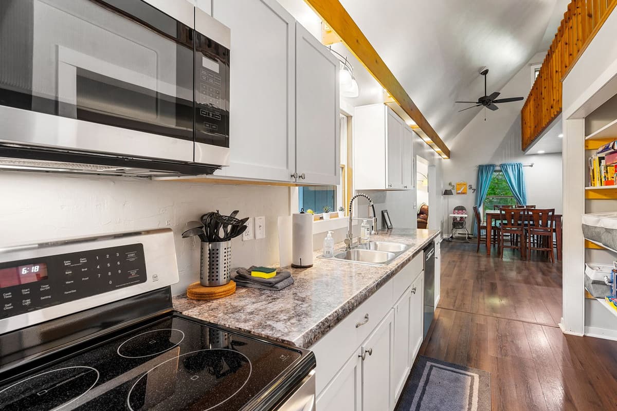 The spacious setup gives you room to prepare meals while staying connected with everyone.