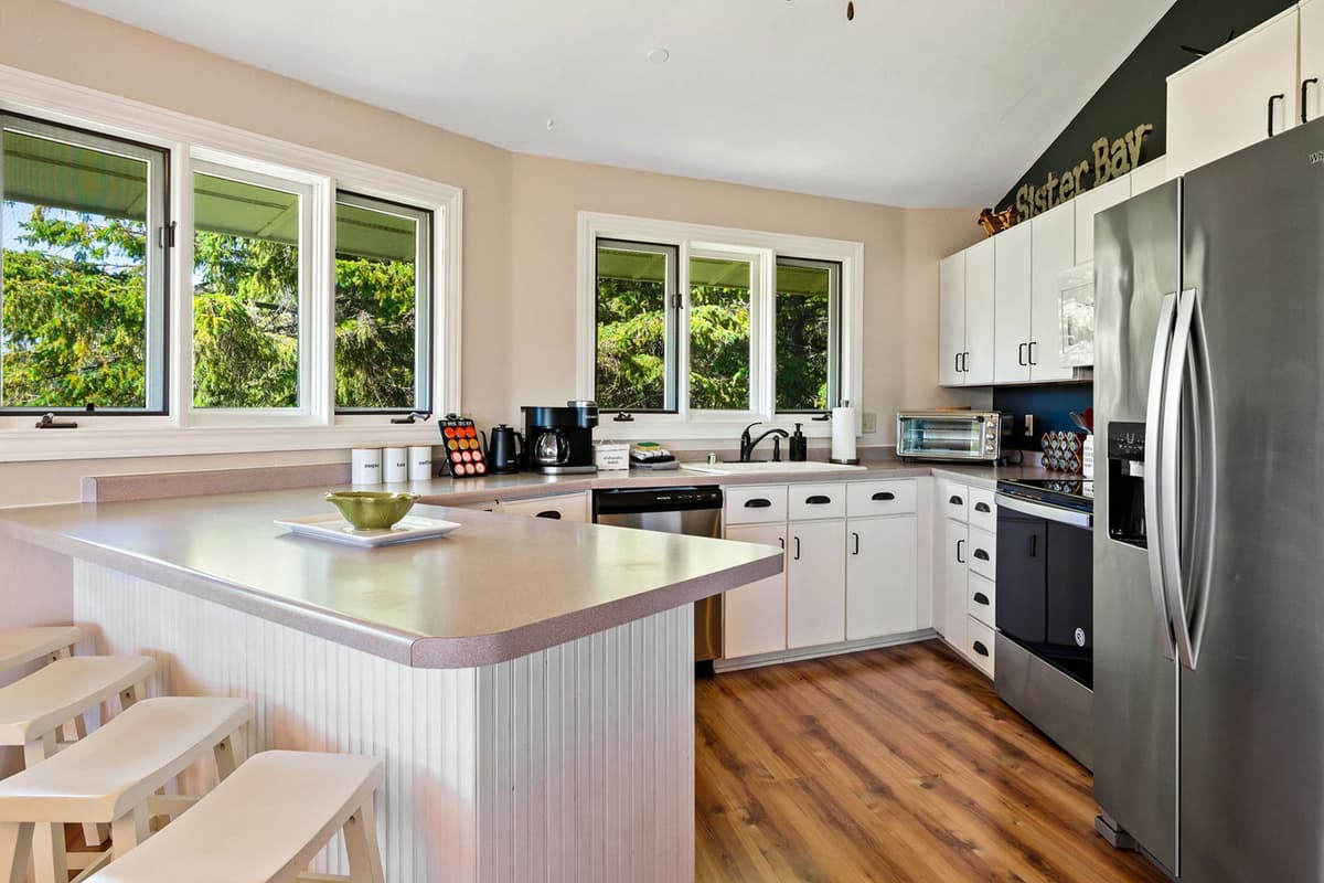 Stainless steel appliances provide a modern touch and make preparing meals simple and convenient.