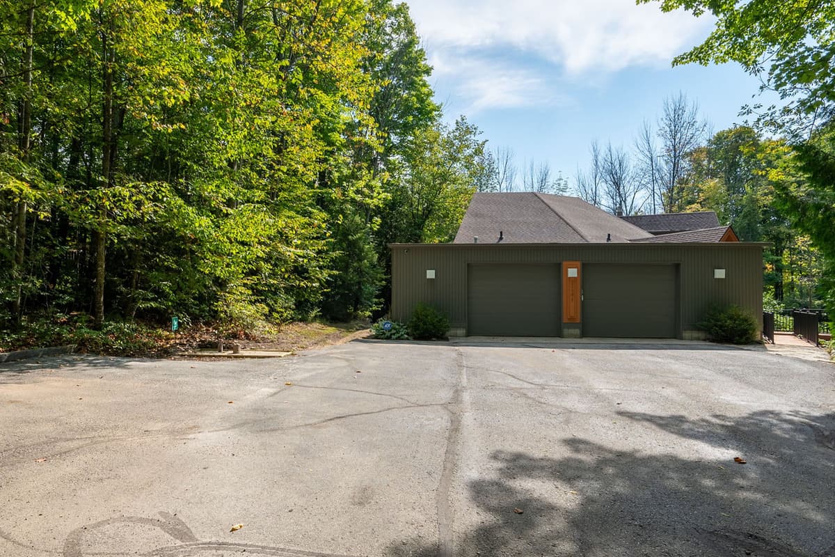 Enjoy convenient parking with space available in both the driveway and garage.