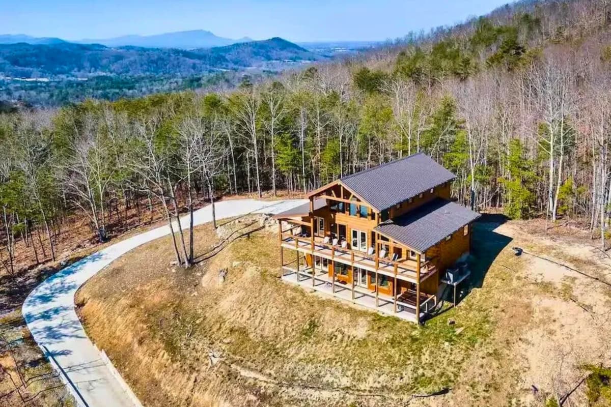 Settle into a cozy cabin surrounded by beautiful Smoky Mountain scenery, where relaxing days and memorable nights come naturally.