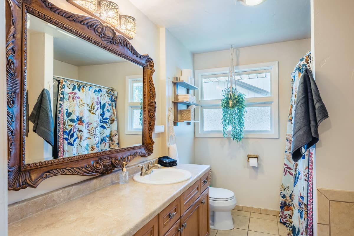 The lower-level bathroom provides a convenient and comfortable space for guests staying on the lower floor.