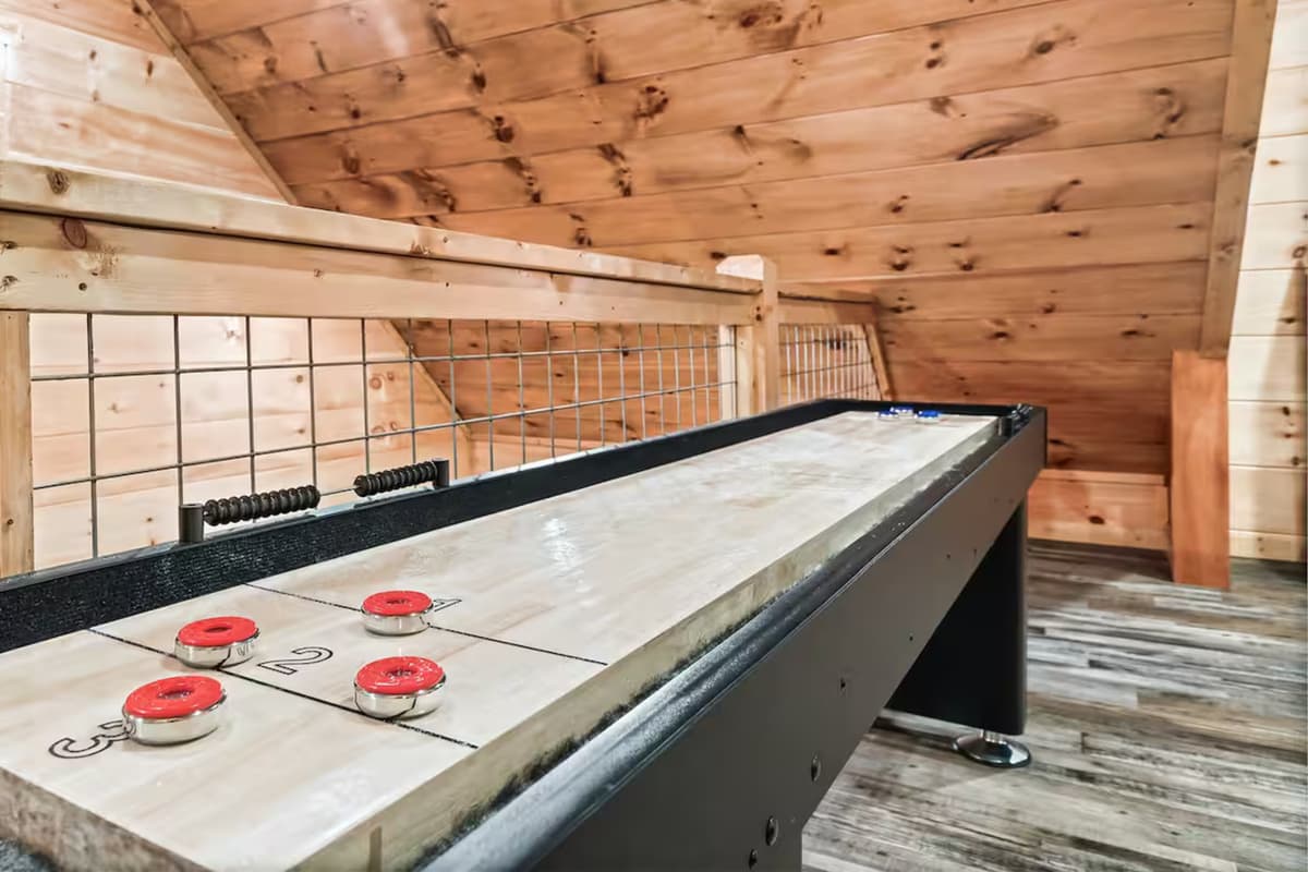 Challenge your crew to a friendly game of shuffleboard! Gather around the shuffleboard table and see who can score the most points.
