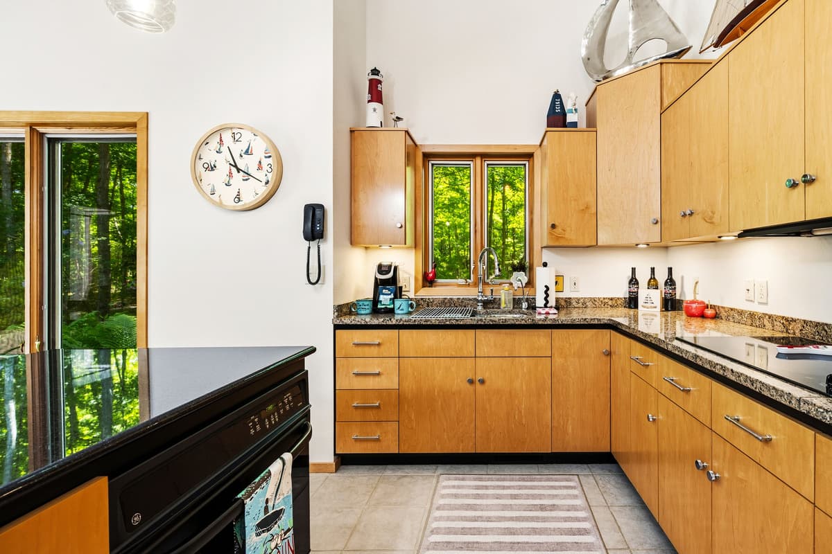 Fully stocked kitchen with modern appliances and everything you need to prepare and enjoy meals during your stay.