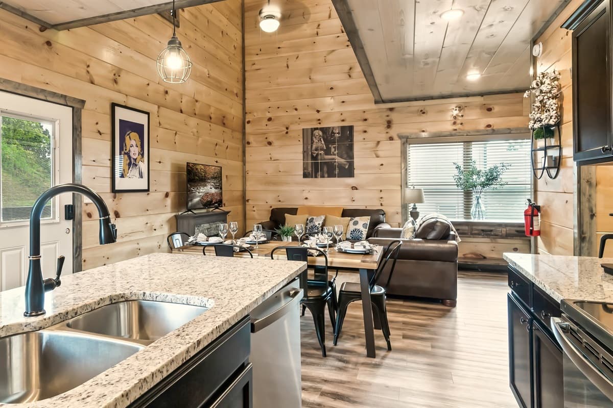Imagine cooking up a delicious meal in this beautiful kitchen, then gathering with loved ones in the cozy living area.