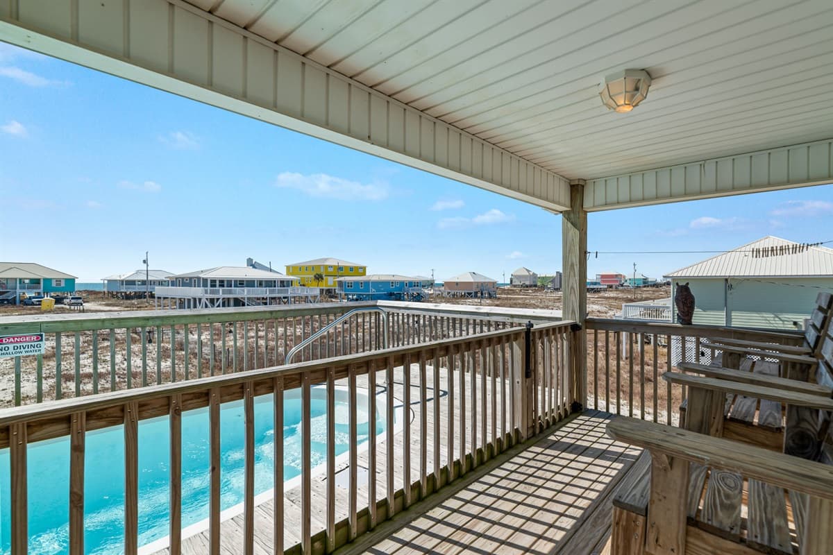 Embrace the beach lifestyle with a vacation home that offers both a pool and oceanfront access.