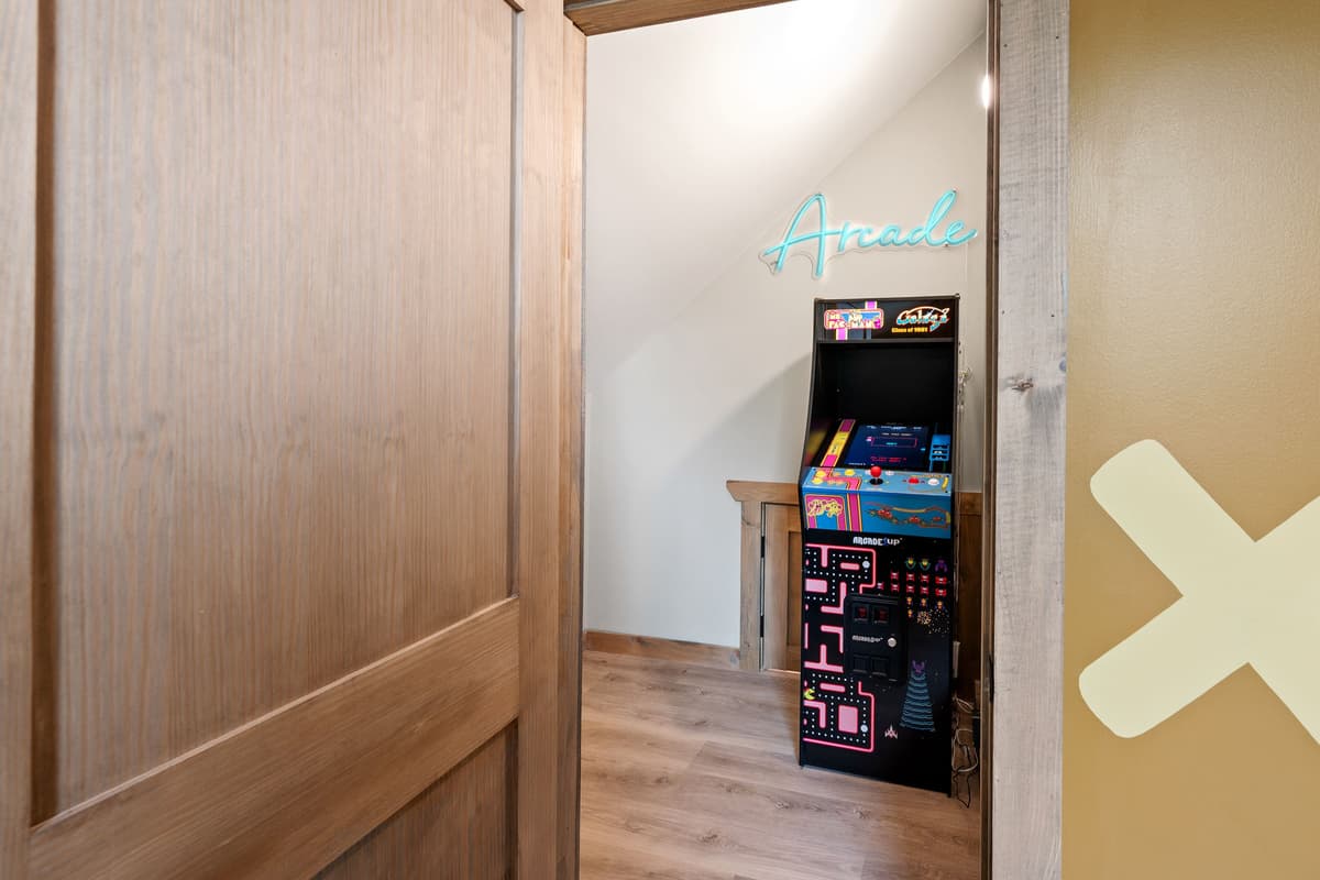 Head upstairs and discover a fun little space where the kids can keep the good times going. Located just outside the bedrooms, the arcade machine is ready for some friendly competition and plenty of laughs.