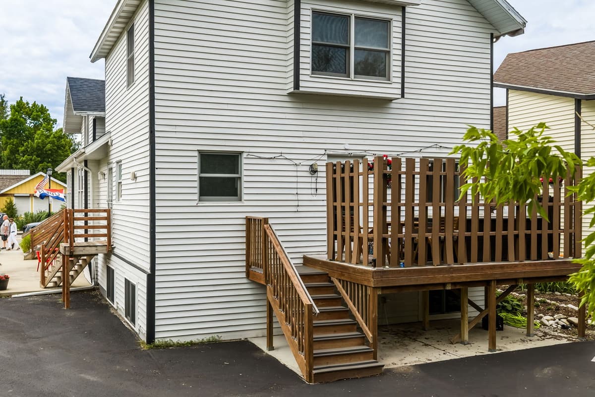 Step outside onto the back deck and enjoy a comfortable outdoor space to relax during your stay.