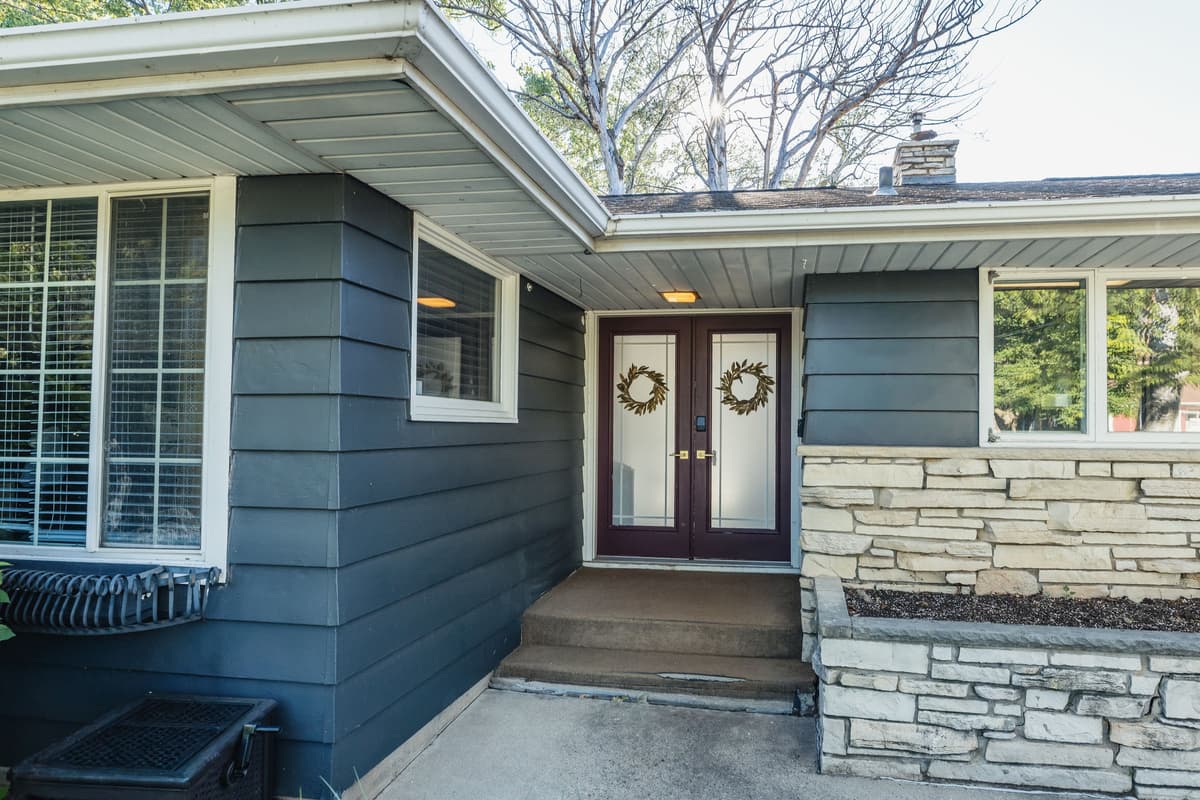 A charming entrance welcomes you to House by the lake.