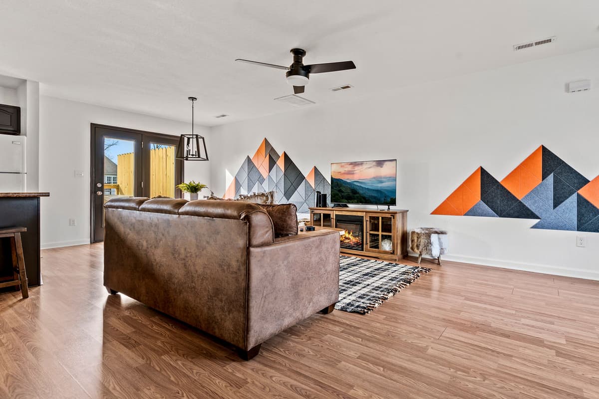 Relax and unwind in the spacious living room, designed with comfort in mind.