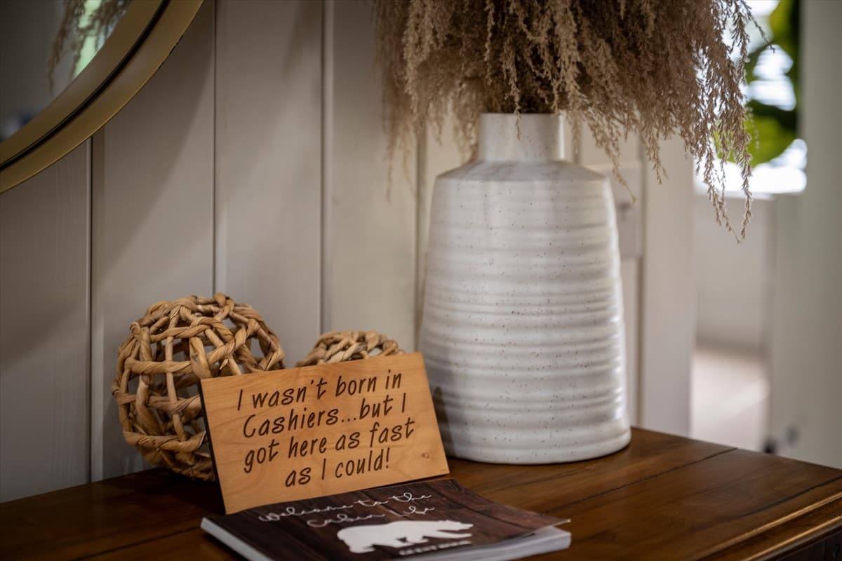 Charming Cashiers Decor Vignette with Local Keepsake Sign and Rustic Accents