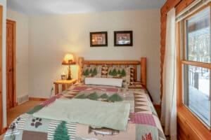 A peaceful queen bedroom designed for comfort and relaxation.