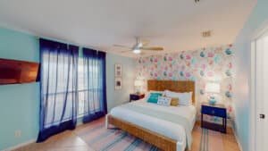 Soft coral tones and coastal charm — your king bedroom retreat for total relaxation.