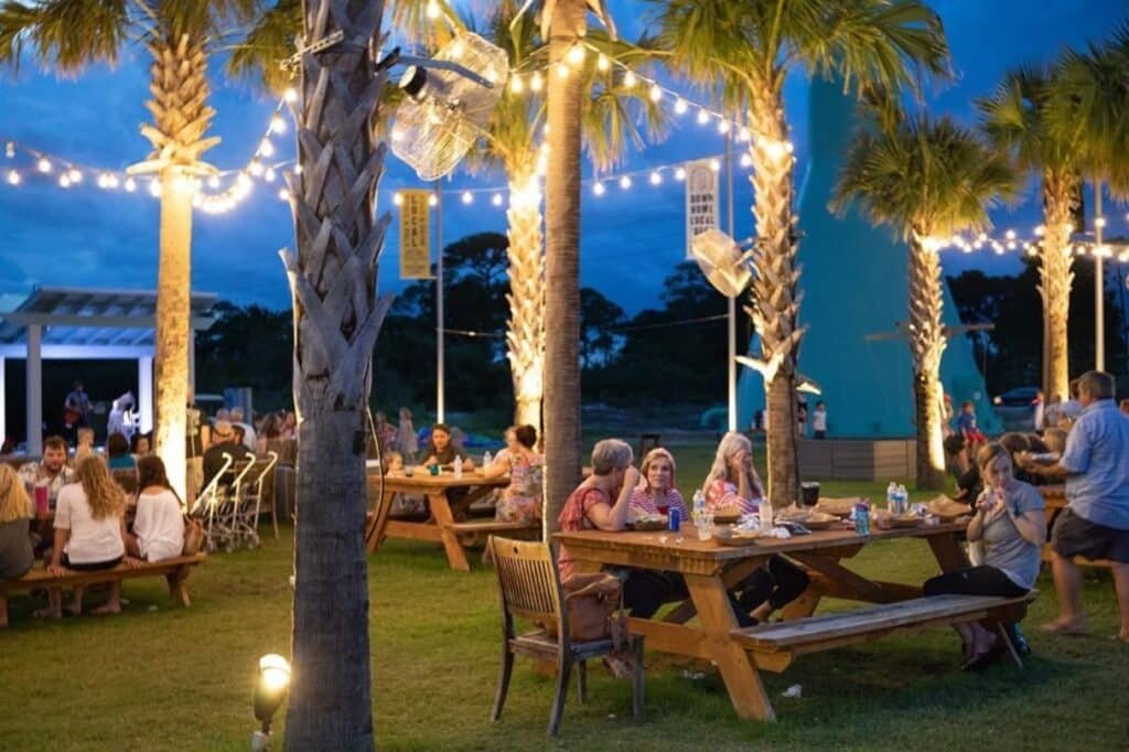 Family enjoying a sunny summer day on the beach in Gulf Shores Alabama
