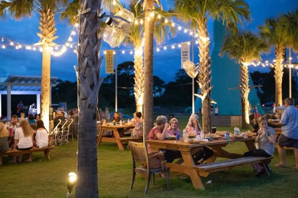 Family enjoying a sunny summer day on the beach in Gulf Shores Alabama