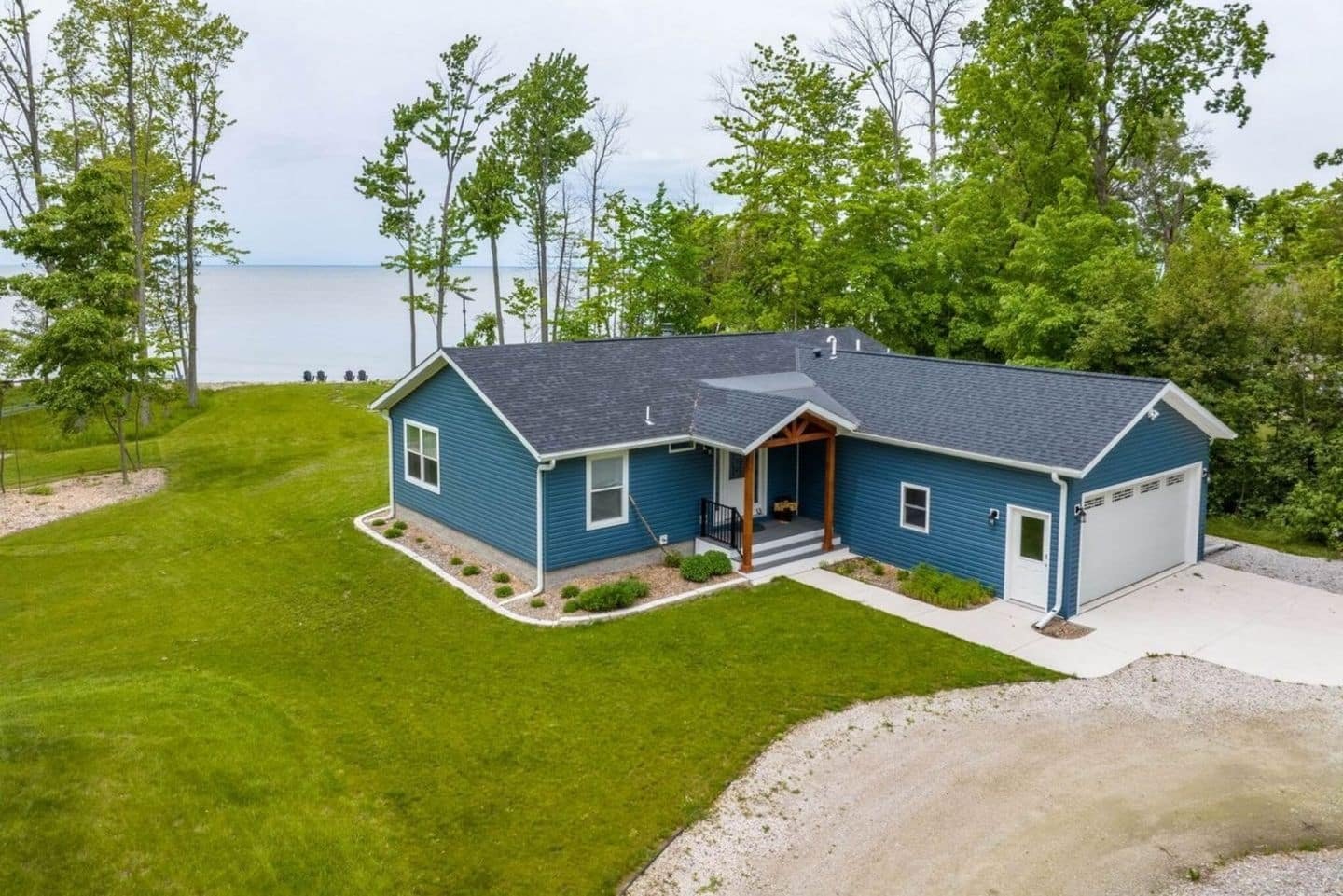 Escape to your lakeside retreat, where calm waters and stunning views await. This vacation house offers the perfect blend of relaxation and adventure, with the lake just steps away from your door.