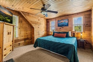 Relax in the king bed while enjoying the view from the windows.