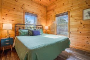 Featuring plush linens, soft pillows, and cozy furnishings, this room is designed for comfort and relaxation.