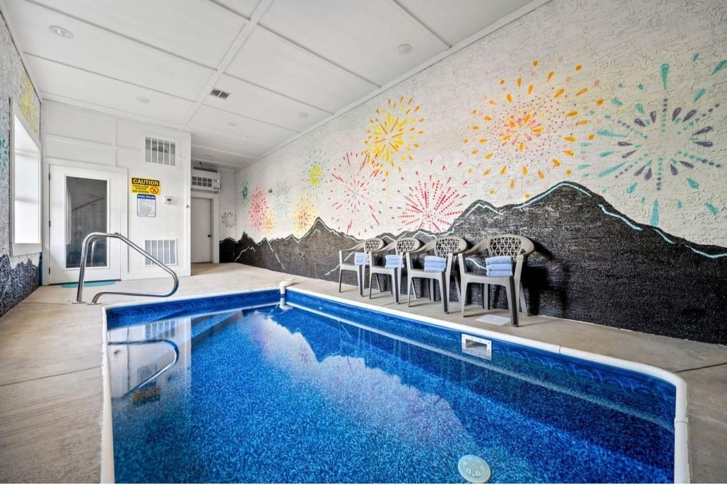 Enjoy a dip in our pool and grab a towel from our stocked supply for a perfect day of relaxation.