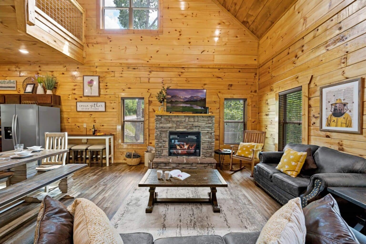 Whether you're relaxing by the fireplace or cooking a delicious meal in the kitchen, our open concept living area is the perfect place to come together and make unforgettable memories.