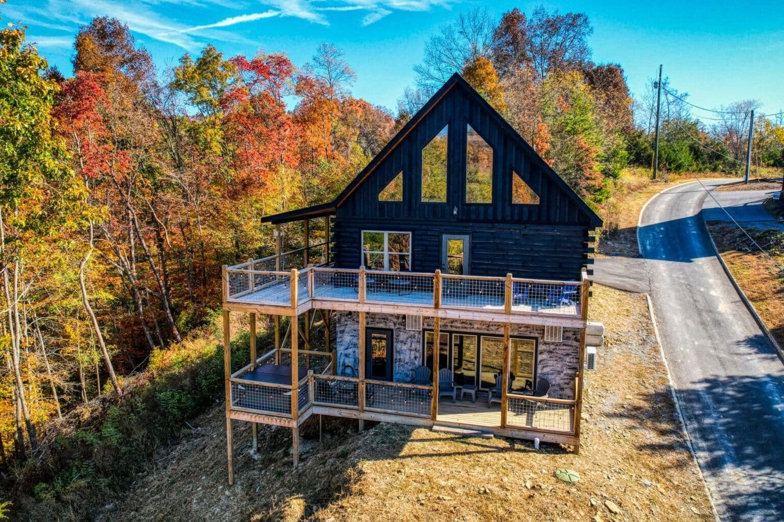 Wake up to golden leaves and crisp mountain air outside your cabin.