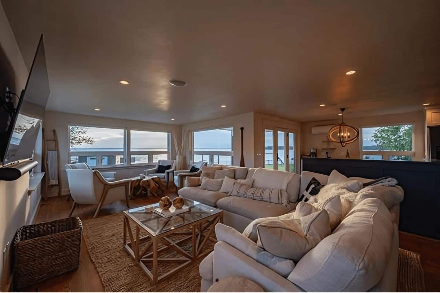 Experience the perfect blend of indoor and outdoor living in this stunning space with panoramic water views.