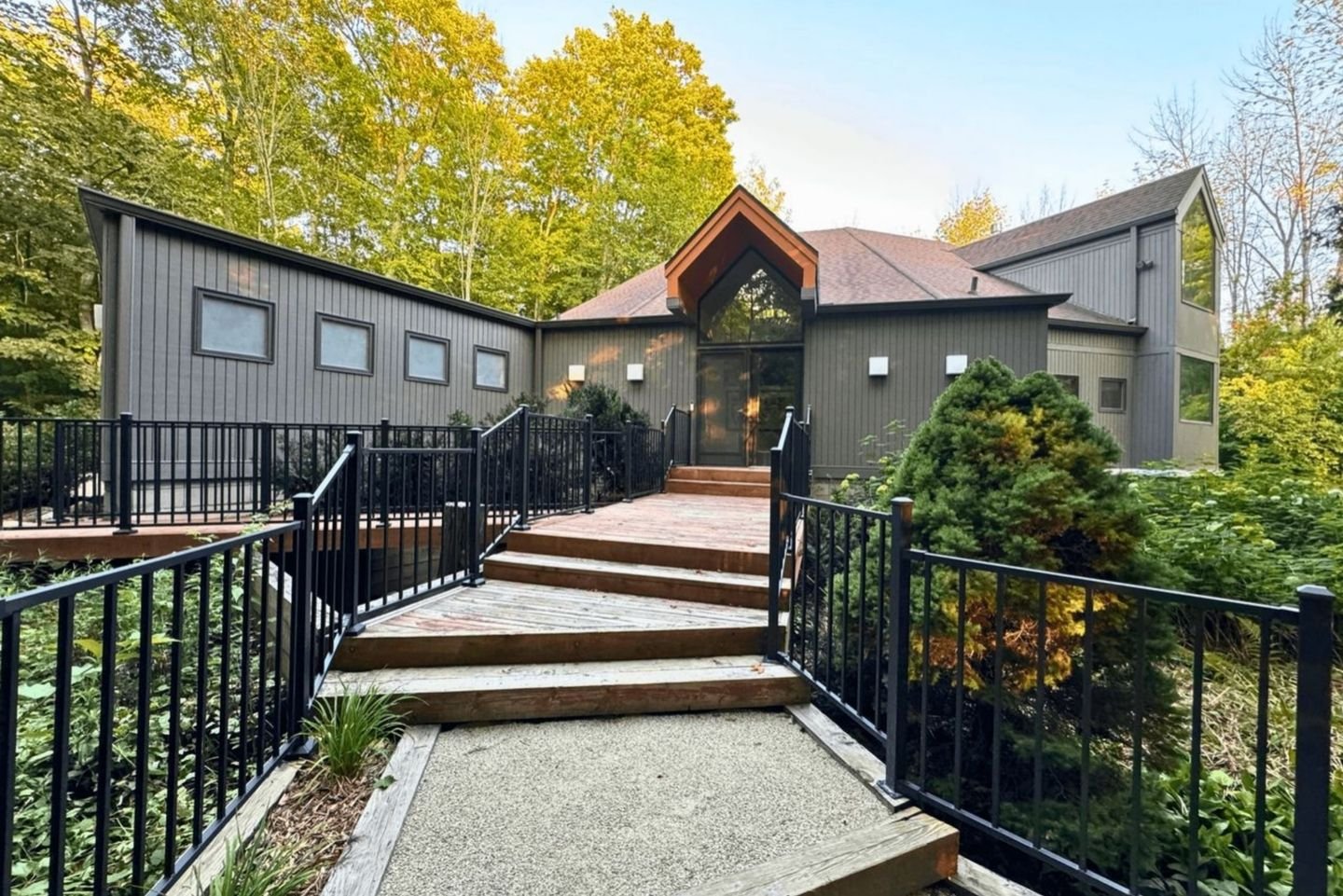 This charming home offers a cozy retreat with beautiful surroundinga